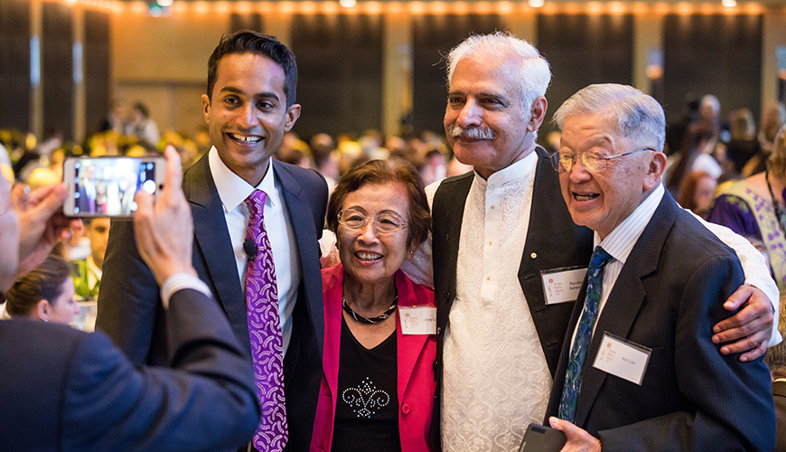 Jeremy Fernandez takes a photo with attendees at 2018 Human Rights Awards