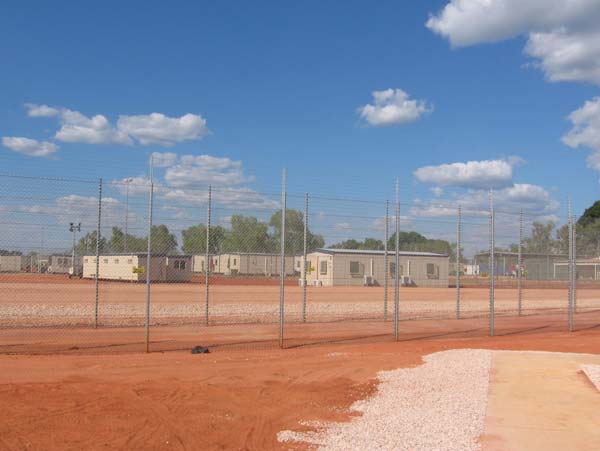 Looking into Curtin IDC through perimeter fence