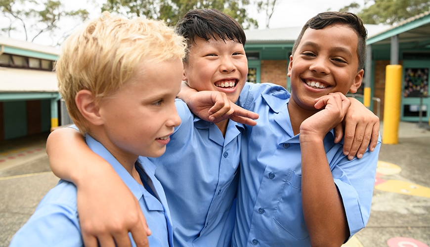 three school boys playing