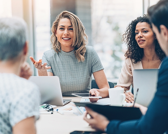 women at workplace meeting