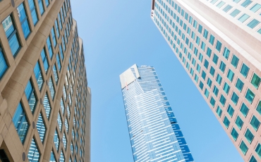 High rise hotels against a blue sky