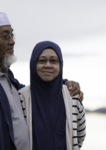 Muslim couple on the beach