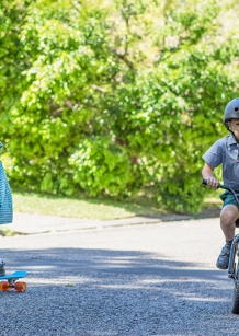 children skating and riding