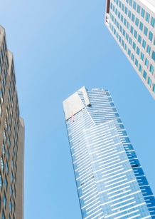 High rise hotels against a blue sky