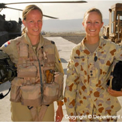 Women soldiers with helicopter. Image (c) Defence